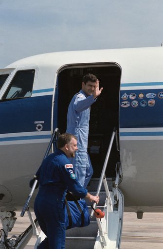 Payload Specialists Garneau and Scully-Power prepare to leave for KSC