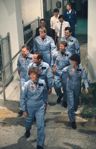 STS 41-G crew prepares to leave Operations and checkout bldg for launch