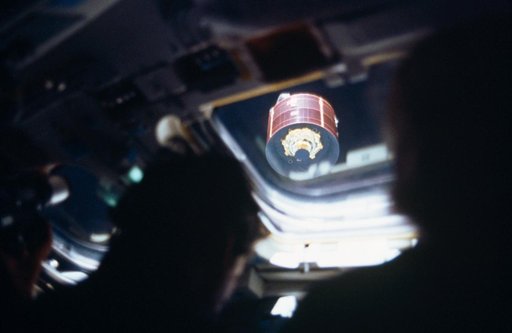 View of the Syncom-IV (LEASAT) satellite from the flight deck window