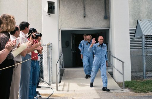 STS 51-F crewmembers depart KSC's operations and checkout building