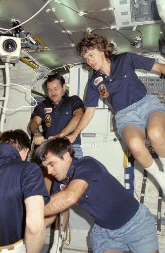 Four STS 51-G crewmembers on Discovery's middeck