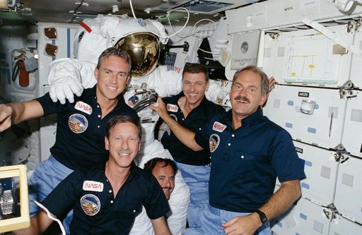 Onboard portrait of the STS 51-I crewmembers in the middeck