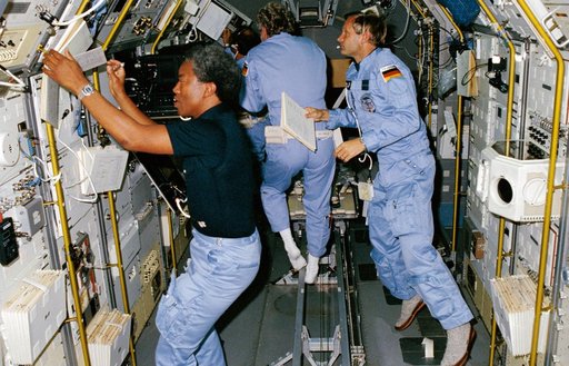 STS 61-A crewmembers in Spacelab D-1 science module