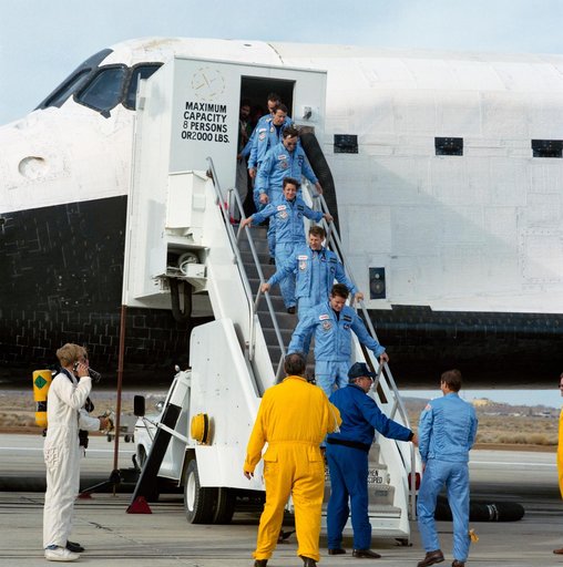 STS 61-B crewmembers egress the Shuttle Atlantis after landing at Edwards