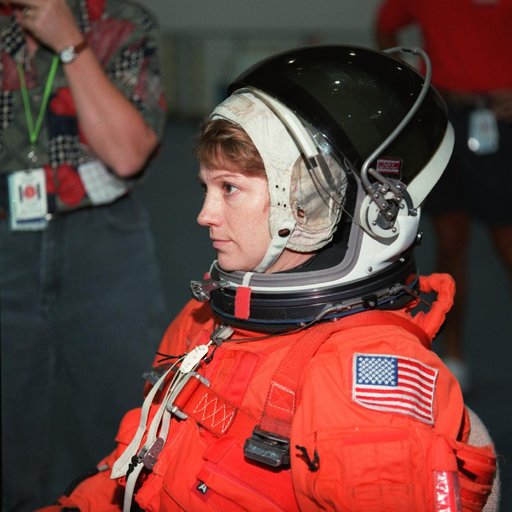 STS-93 crewmembers engage in water survival training at the NBL