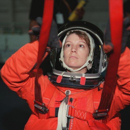 STS-93 crewmembers engage in water survival training at the NBL