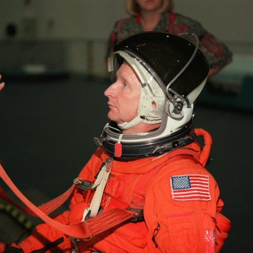 STS-93 crewmembers engage in water survival training at the NBL