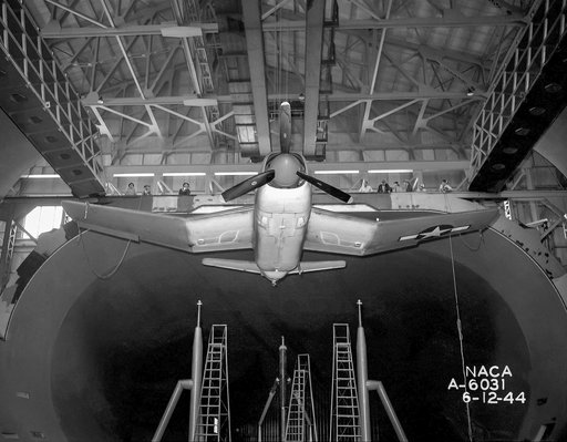 Mounting Douglas SB-2D Airplane in 40x80 foot Wind Tunnel at NACA Ames Research Center.