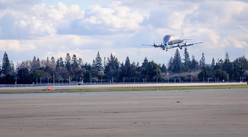 NASAs B377SGT Super Guppy Turbine Cargo Airplane lands at Moffett Field at NASA Ames.