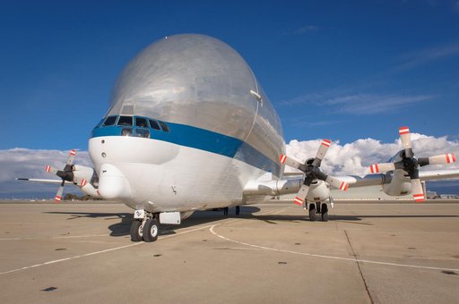 NASAs B377SGT Super Guppy Turbine Cargo Airplane lands at Moffett Field at NASA Ames.