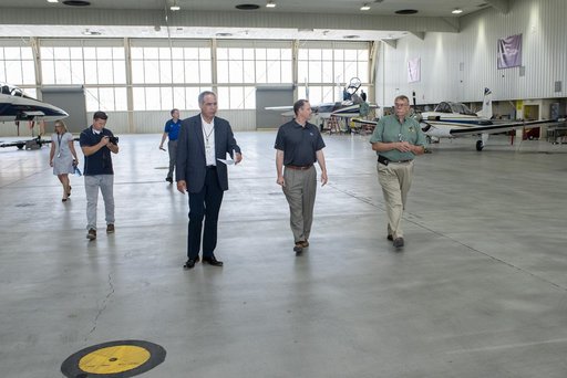 NASA Administrator Bridenstine and Armstrong Center Director McBride discuss the capabilities and use of aircraft for flight research inside one of the aircraft hangars at the center.