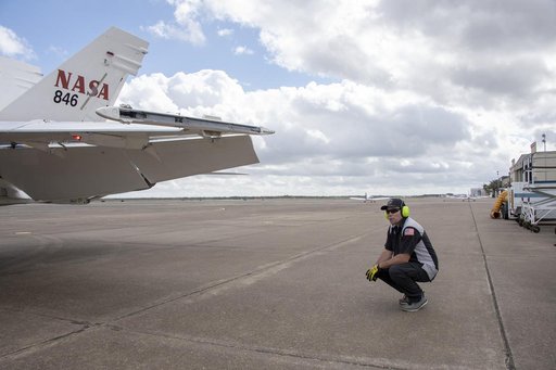 NASA Ground Crews Prepare F/A-18 for QSF18 Takeoff