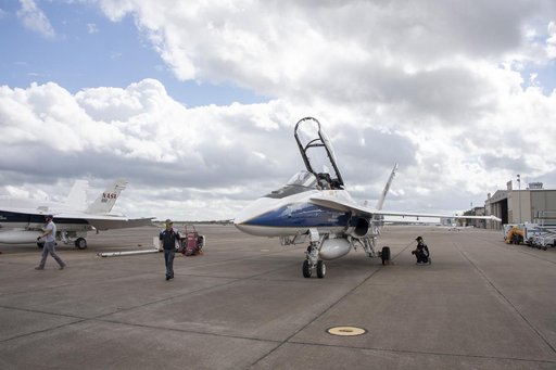 NASA Ground Crews Prepare F/A-18 for QSF18 Takeoff
