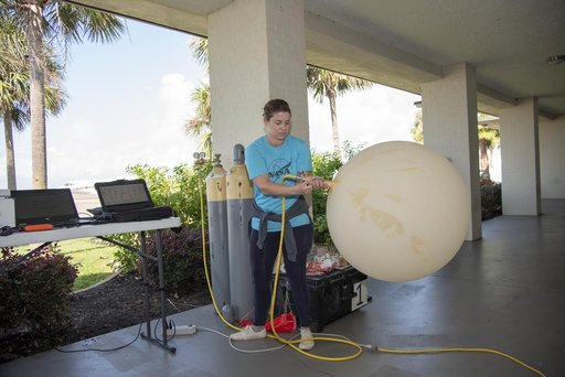 NASA Meteorologists Launch Weather Balloon Before Research Flight