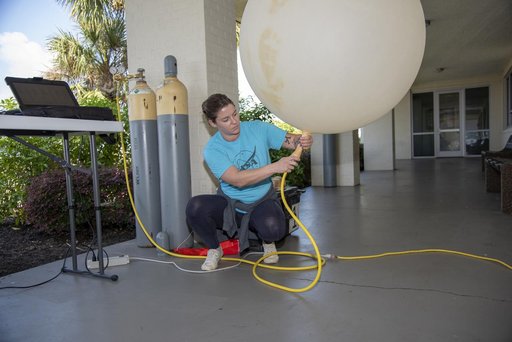 NASA Meteorologists Launch Weather Balloon Before Research Flight