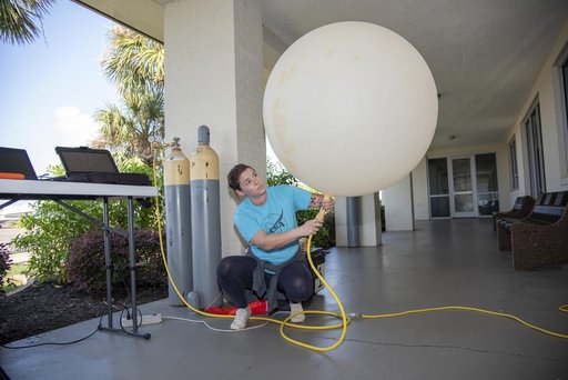 NASA Meteorologists Launch Weather Balloon Before Research Flight