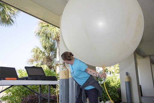 NASA Meteorologists Launch Weather Balloon Before Research Flight
