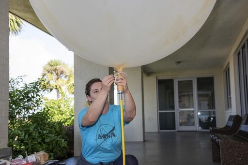 NASA Meteorologists Launch Weather Balloon Before Research Flight