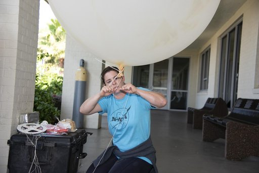 NASA Meteorologists Launch Weather Balloon Before Research Flight