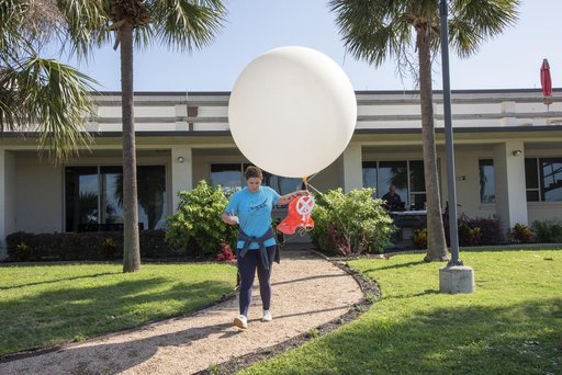 NASA Meteorologists Launch Weather Balloon Before Research Flight