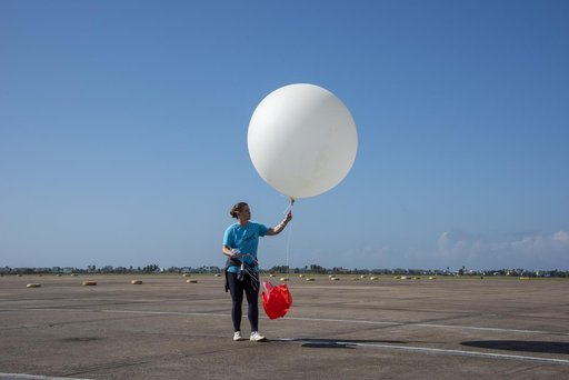 NASA Meteorologists Launch Weather Balloon Before Research Flight