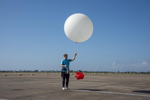 NASA Meteorologists Launch Weather Balloon Before Research Flight