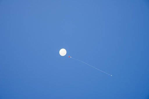 NASA Meteorologists Launch Weather Balloon Before Research Flight