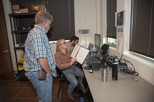 QSF18 Field Research Team Monitors Data from Flight