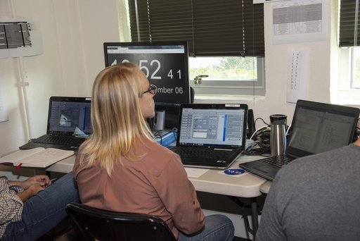 QSF18 Field Research Team Monitors Data from Flight