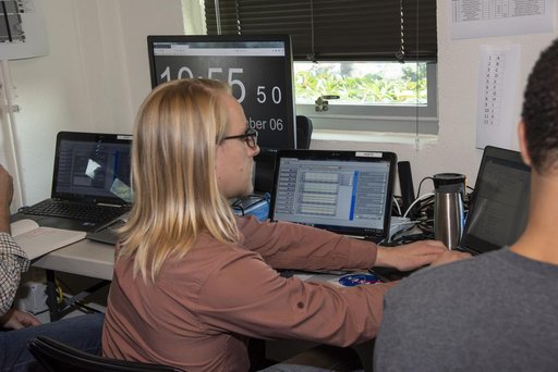 QSF18 Field Research Team Monitors Data from Flight