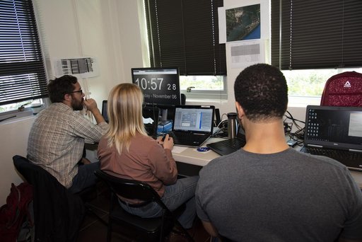 QSF18 Field Research Team Monitors Data from Flight