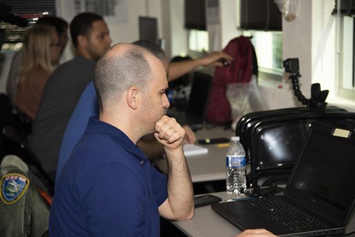 QSF18 Field Research Team Monitors Data from Flight