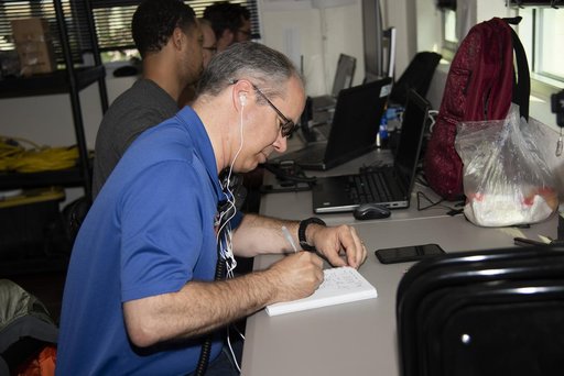 QSF18 Field Research Team Monitors Data from Flight