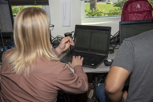 QSF18 Field Research Team Monitors Data from Flight