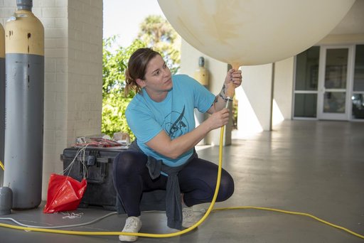 NASA Meteorologists Launch Weather Balloon Before Research Flight