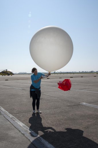 NASA Meteorologists Launch Weather Balloon Before Research Flight