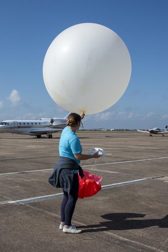 NASA Meteorologists Launch Weather Balloon Before Research Flight