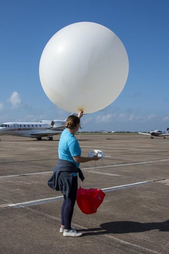 NASA Meteorologists Launch Weather Balloon Before Research Flight
