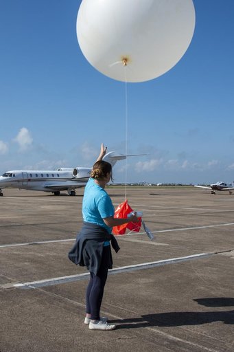 NASA Meteorologists Launch Weather Balloon Before Research Flight