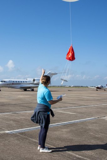 NASA Meteorologists Launch Weather Balloon Before Research Flight