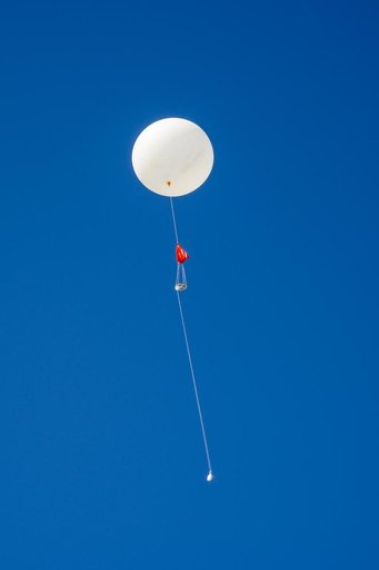 NASA Meteorologists Launch Weather Balloon Before Research Flight