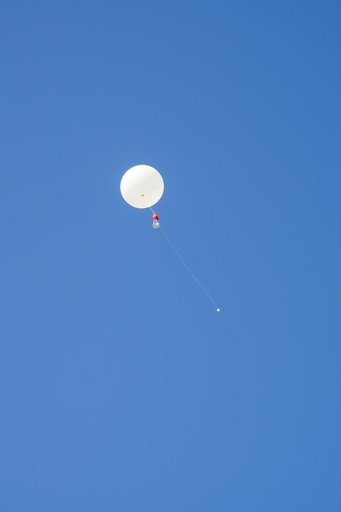 NASA Meteorologists Launch Weather Balloon Before Research Flight