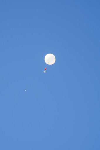 NASA Meteorologists Launch Weather Balloon Before Research Flight
