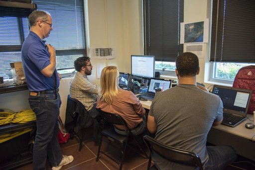 QSF18 Field Research Team Monitors Data from Flight