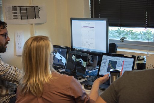 QSF18 Field Research Team Monitors Data from Flight