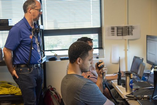 QSF18 Field Research Team Monitors Data from Flight