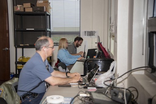 QSF18 Field Research Team Monitors Data from Flight
