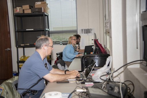 QSF18 Field Research Team Monitors Data from Flight