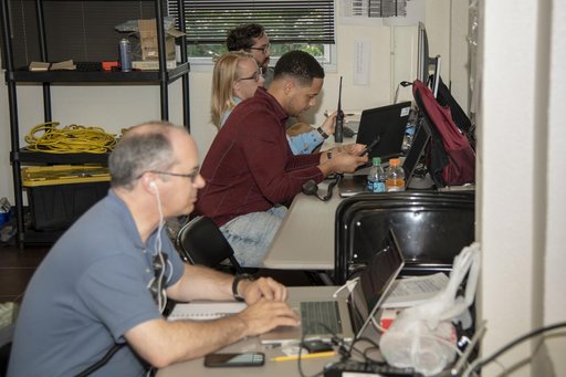 QSF18 Field Research Team Monitors Data from Flight