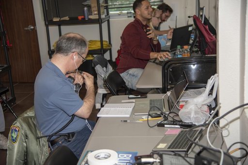 QSF18 Field Research Team Monitors Data from Flight